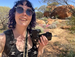 woman holding camera