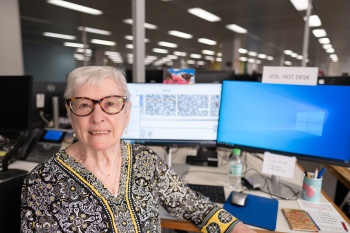 Volunteer at her desk