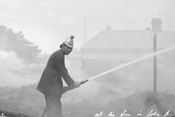 Fireman at a fire in John Street 1922
