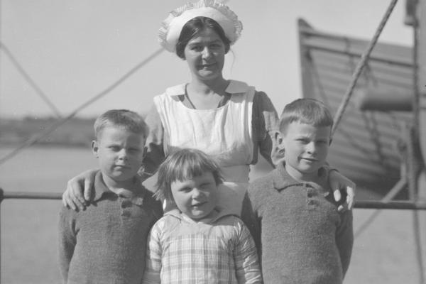 Orphaned children and nurse c1924
