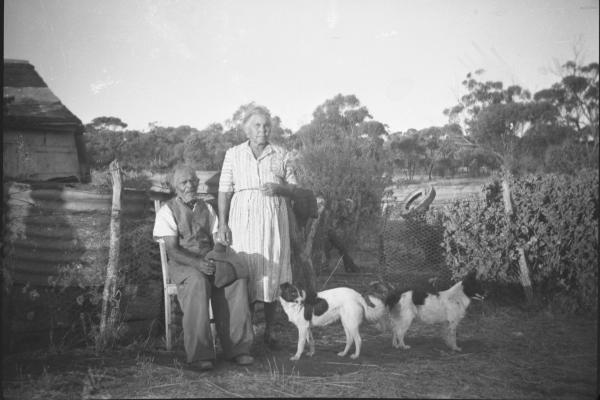 Martin and Julia Walley on their farm near Goomalling with their dogs ca1960