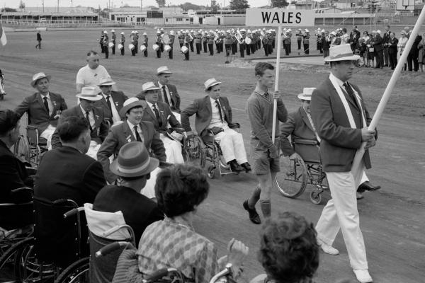 Opening ceremony of Commonwealth Paraplegic Games Parade of Nations showing Welsh team