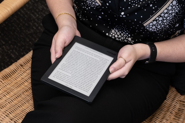 Person reading eBook on eReader