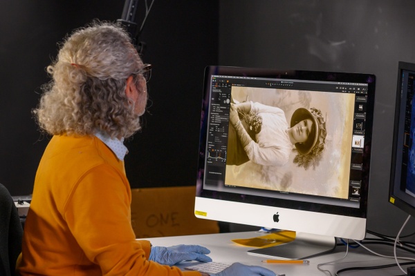 Scanning and digitising an old photograph in the preservation lab