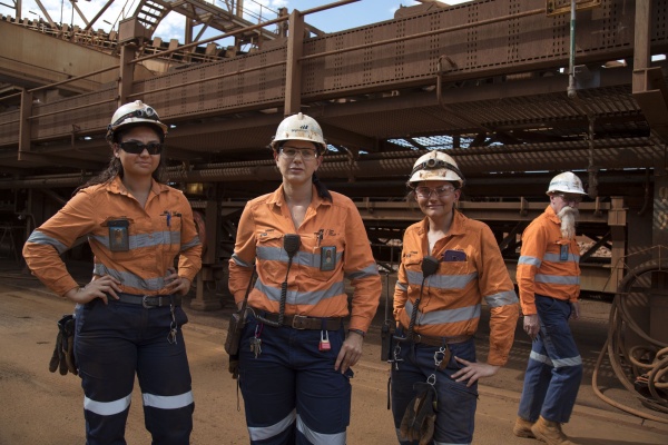Mechanical fitter apprentice Alex Remkes with production technicians Sammy Petrucco and Jo Anne Secker working at the BHP Billiton port facility in Port Hedland 2017