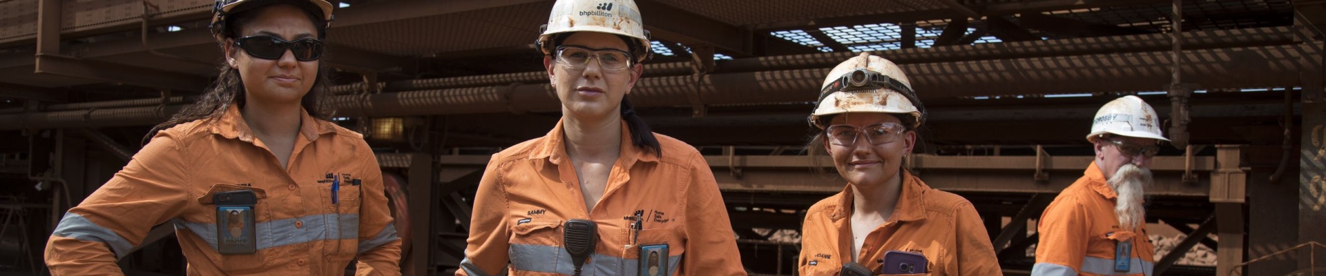 Mechanical fitter apprentice Alex Remkes with production technicians Sammy Petrucco and Jo Anne Secker working at the BHP Billiton port facility in Port Hedland 2017