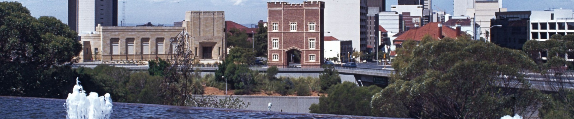 View from Parliament House fountains to Barracks Arch and Perth city 1980