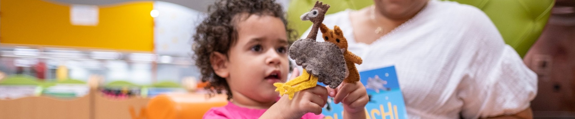 Playing with an animals toys in The Story Place
