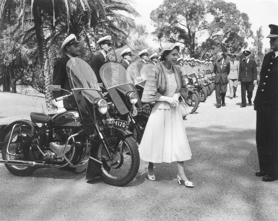 Royal visit inspecting motorcycle police escort 1954