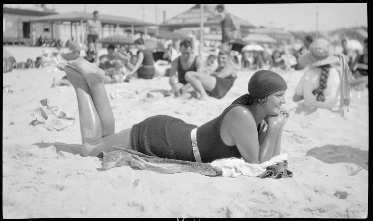 Miss Jones relaxing at Cottesloe Beach c1923