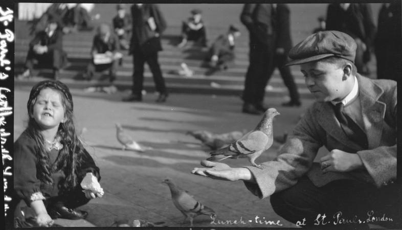 Feeding pigeons near St Pauls London Around 1920-1922