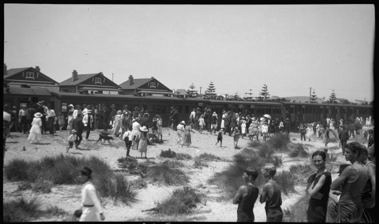 Day trippers board Mr Cowells excursion train at South Beach around 1923