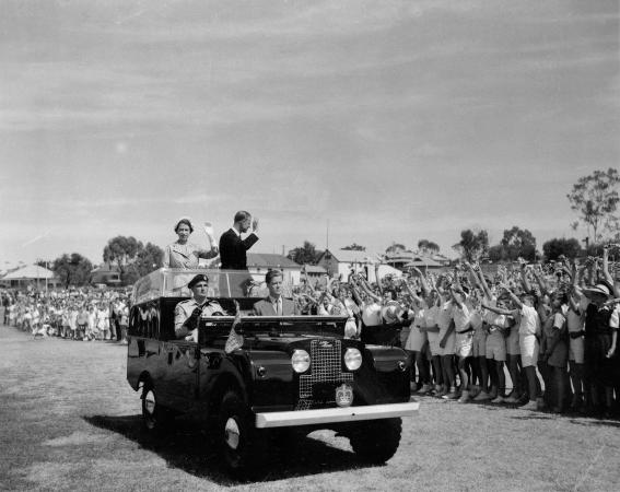 Queen Elizabeth II waving to children Royal visit 1954