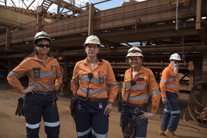 Mechanical fitter apprentice Alex Remkes with production technicians Sammy Petrucco and Jo Anne Secker working at the BHP Billiton port facility in Port Hedland 2017