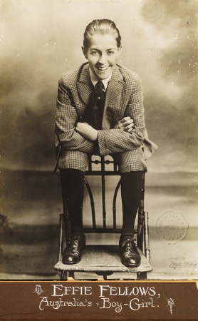 Studio portrait of Effie Fellows dressed in a knickerbocker suit