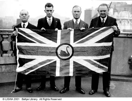 The four secessionist delegates holding the proposed flag for Western Australia on the roof of the Savoy House Oct 1934 