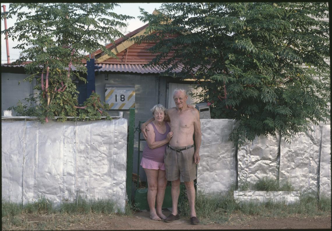 146409PD Mick and Mona Braddock at the front gate of their home 18 Hainault Road Boulder 1991-1992