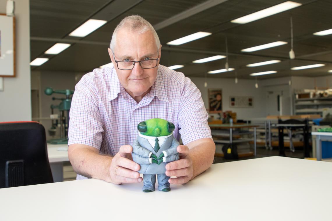 Peter Williams donating Shaun Tans Cicada sculpture