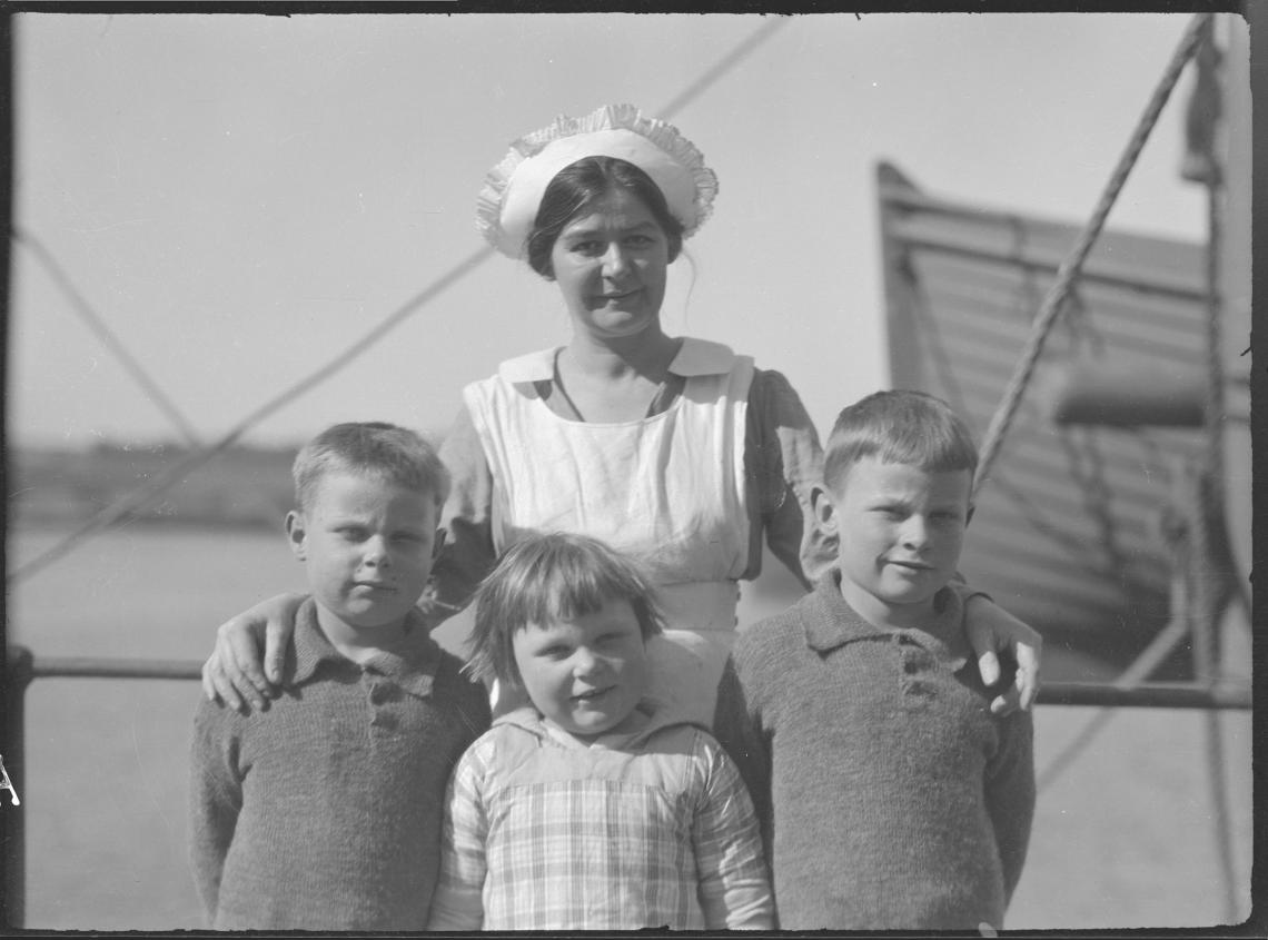 Orphaned children and nurse c1924