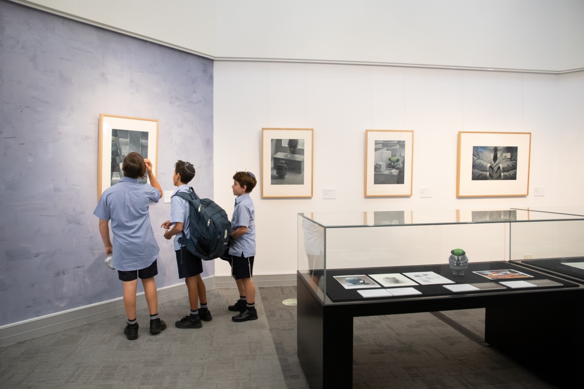 School pupils looking at exhibition in Ground Floor Gallery