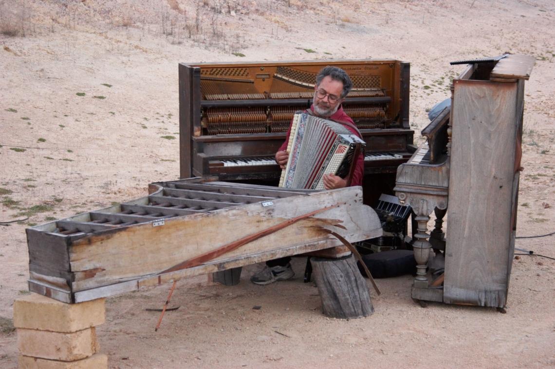Ross Bolleter playing the accordion at Ruined Piano Sanctuary Performance
