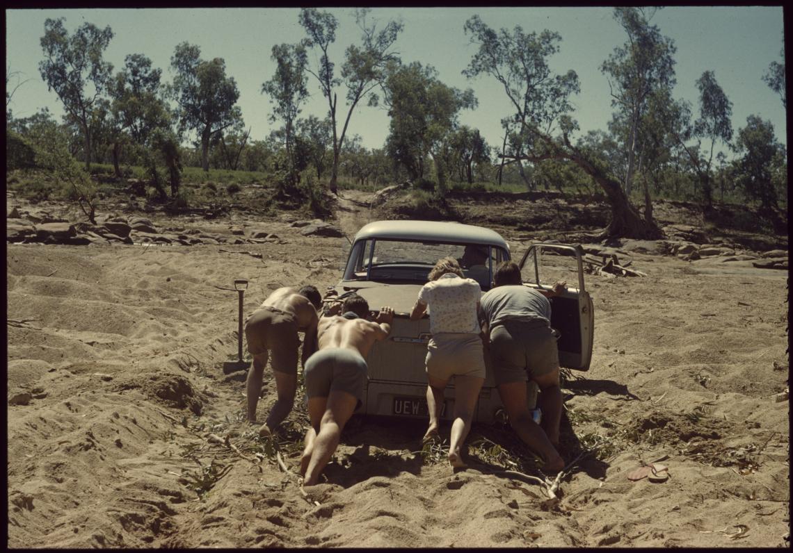 Bogged in the Leonard River on the way back to Derby Derek Green Ian Moore Robin Berry and Bob Deal May 1962