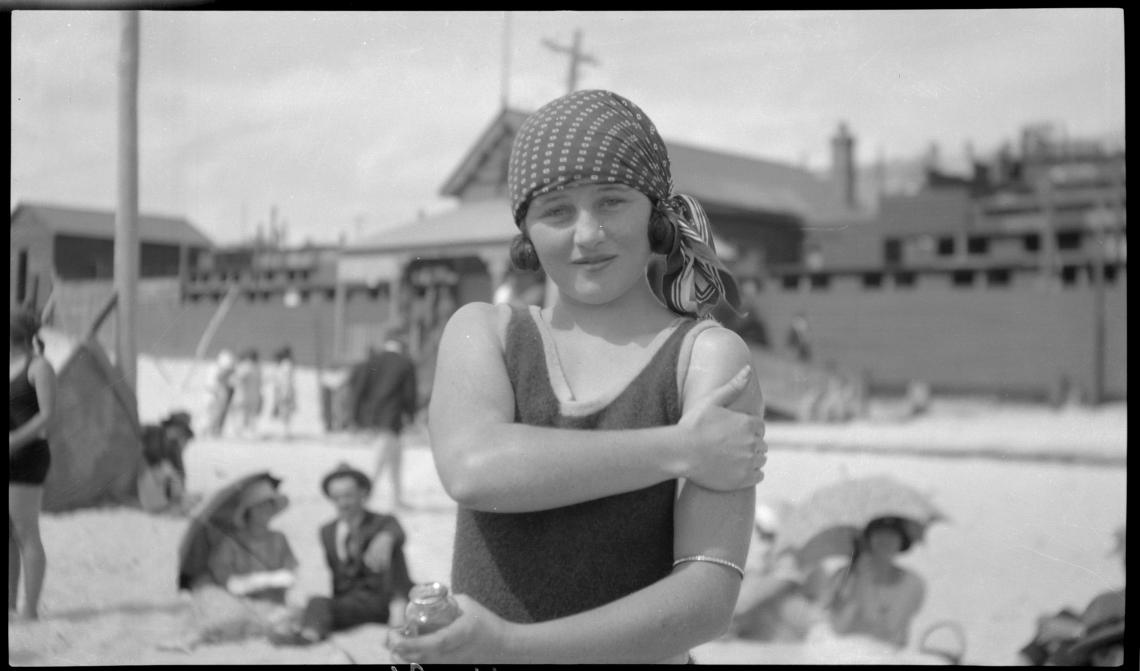 Applying lotion at Cottesloe Beach around 1923