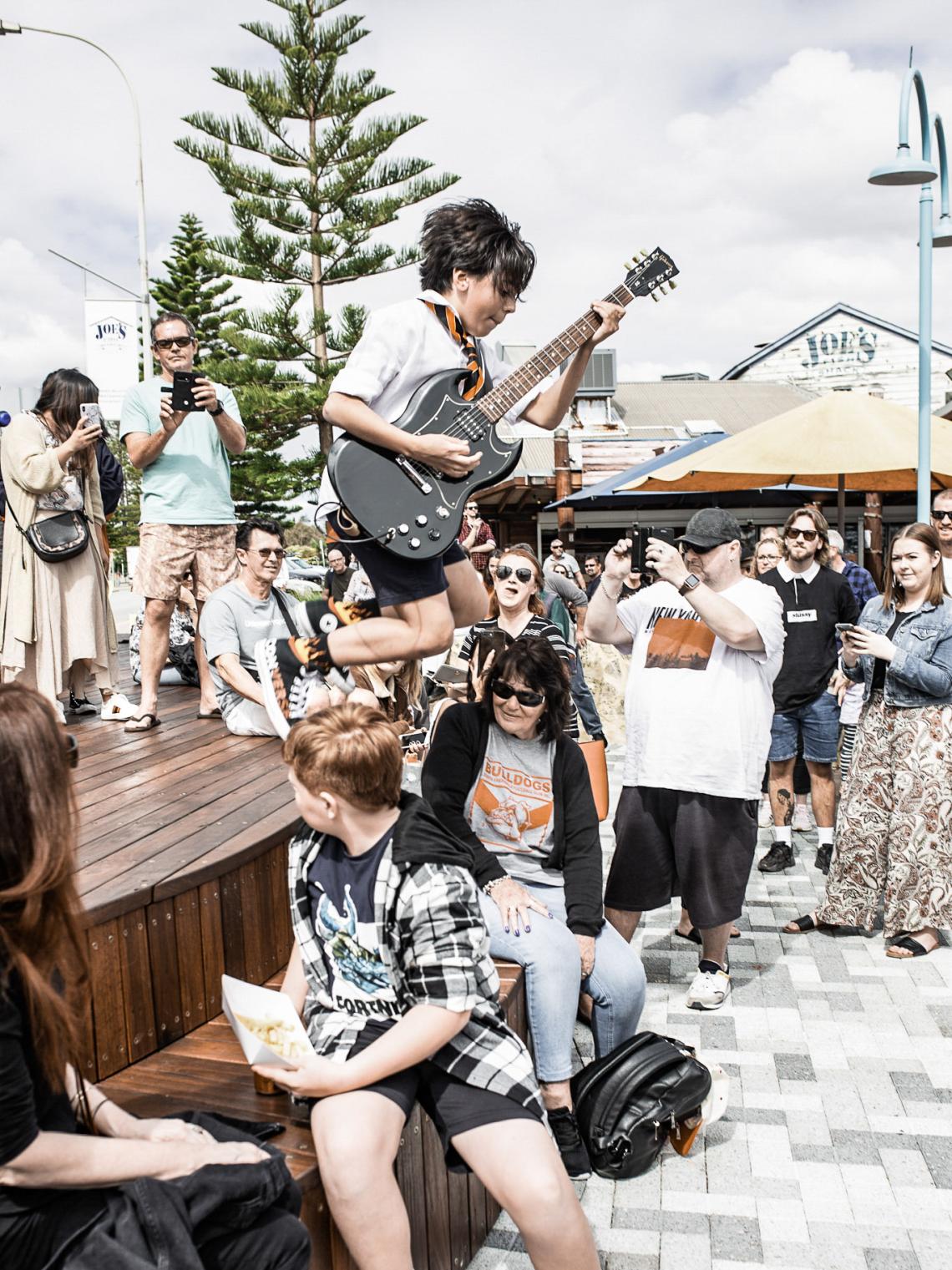 Jayden Tatasciore performs at the launch of the Bon Scott Stage at Fremantle Fishing Boat Harbour 2020