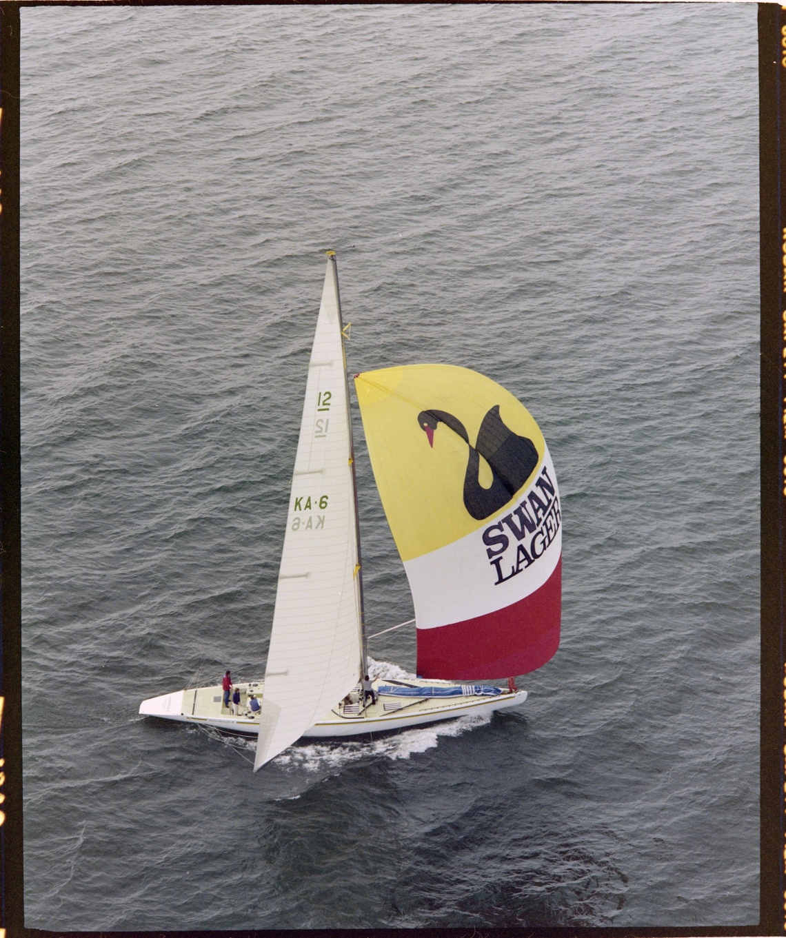 Australia II on trials off Fremantle and crew members 7 July 1982