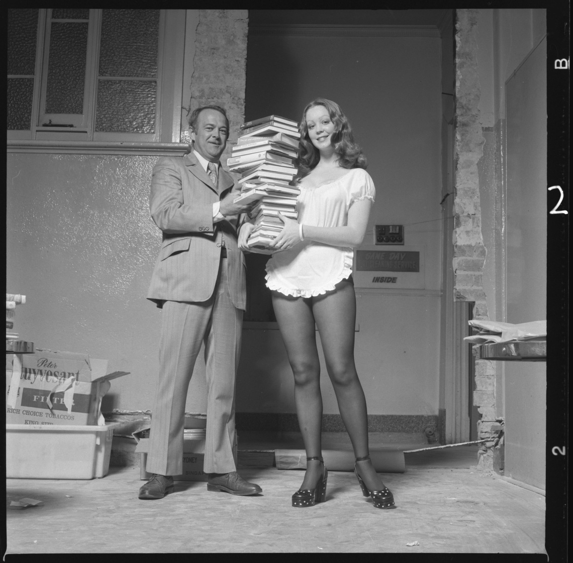 A model poses for an Alberts Bookshop sales catalogue August 1972