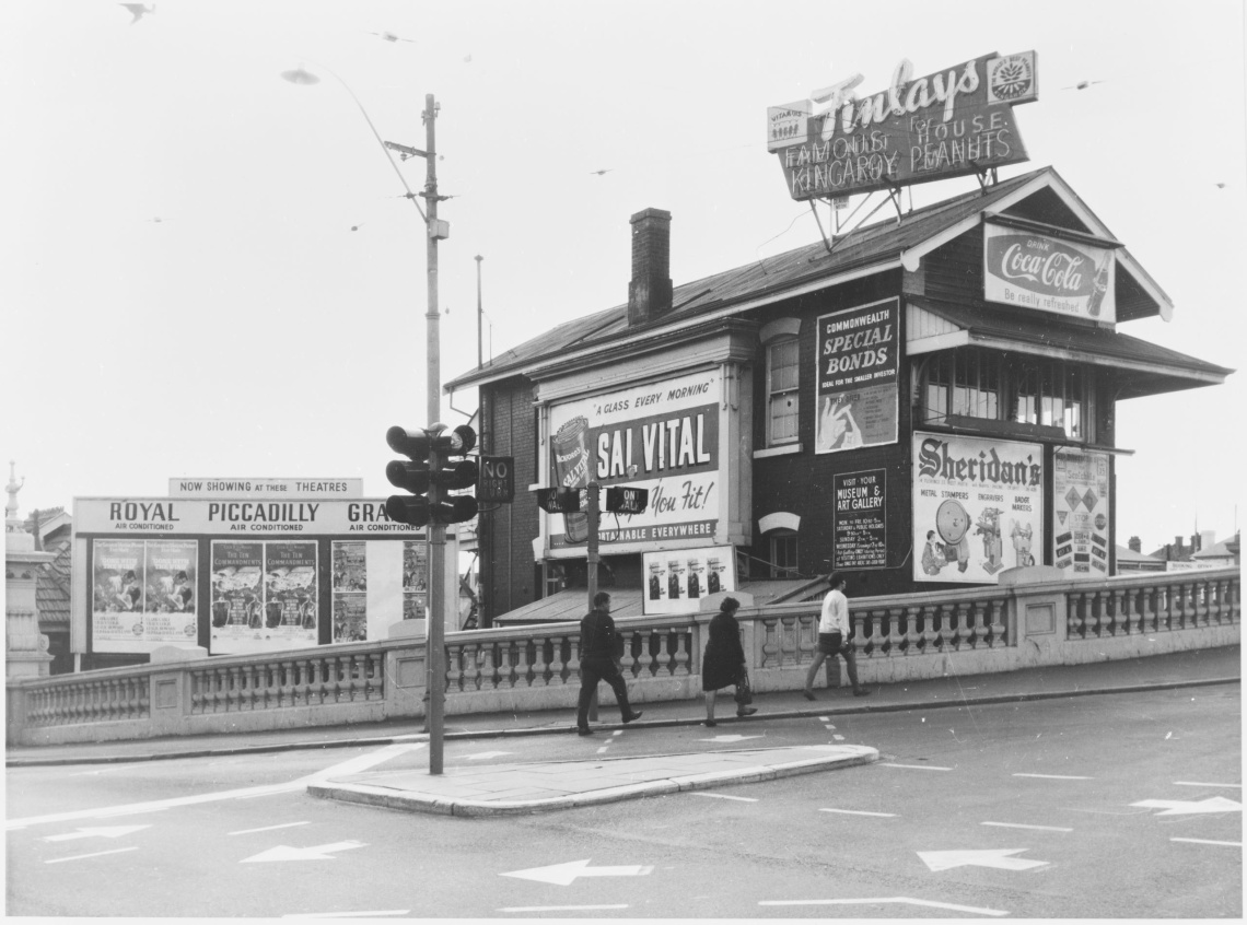 Signal Box C covered in advertising hoardings beside the Barrack Street Bridge Perth in 1968