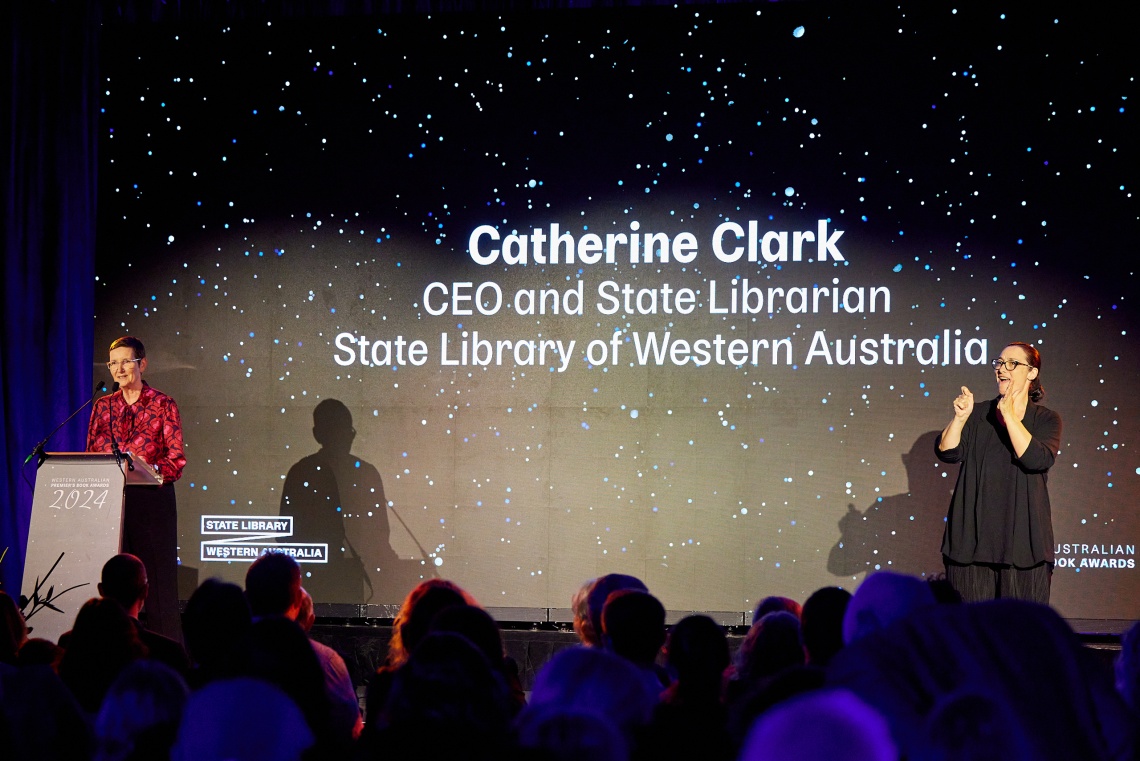 Catherine Clark CEO and State Librarian MC and Auslan interpreter