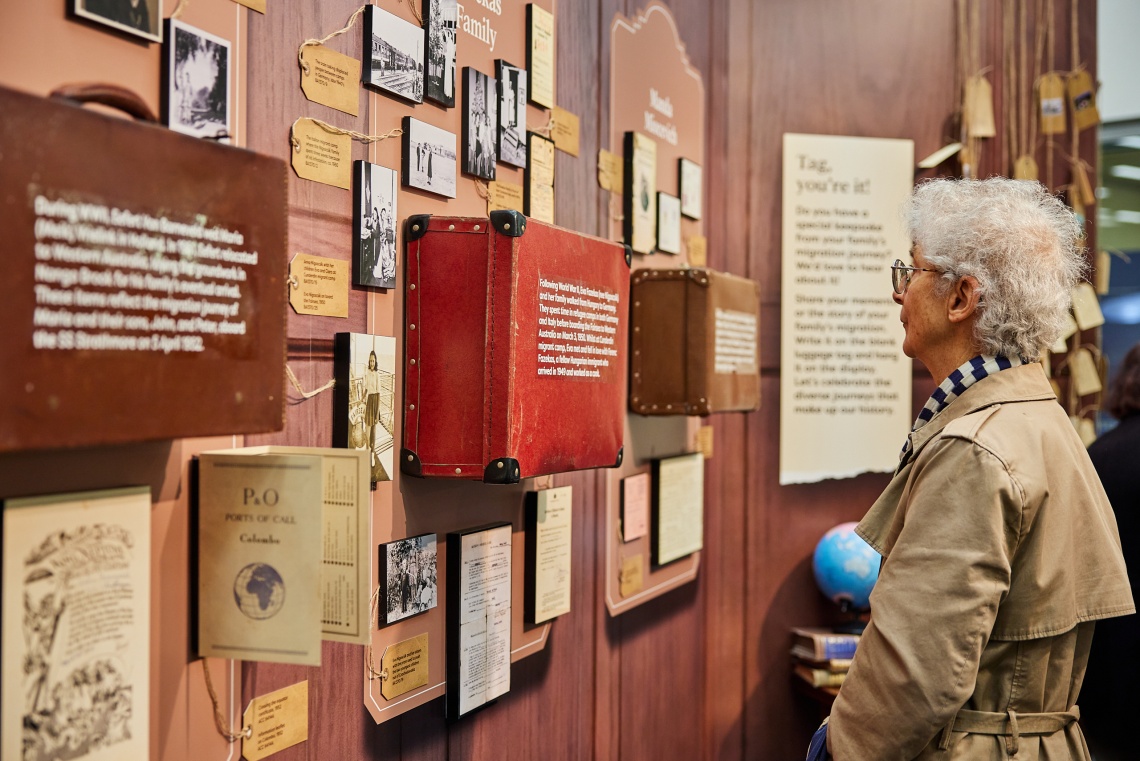 Woman looking at Keepsake exhibition