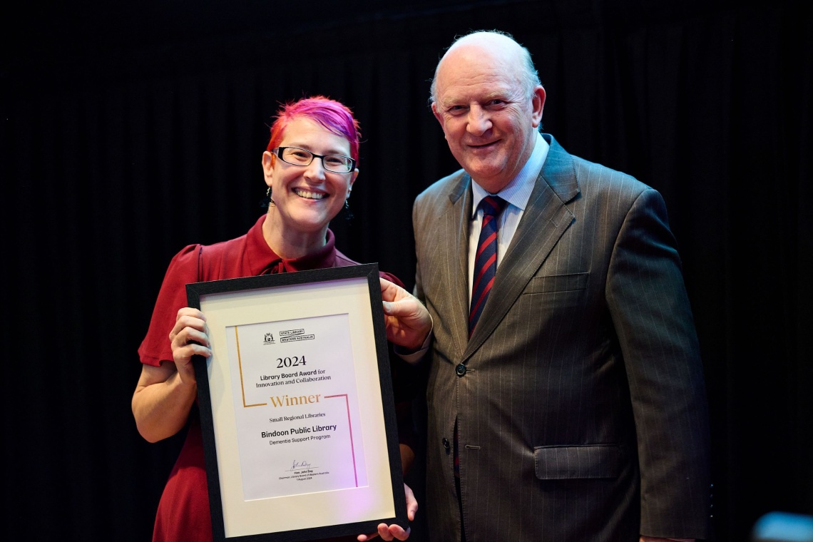 Annie Hudson Manager at the Bindoon Library accepting award from Hon John Day