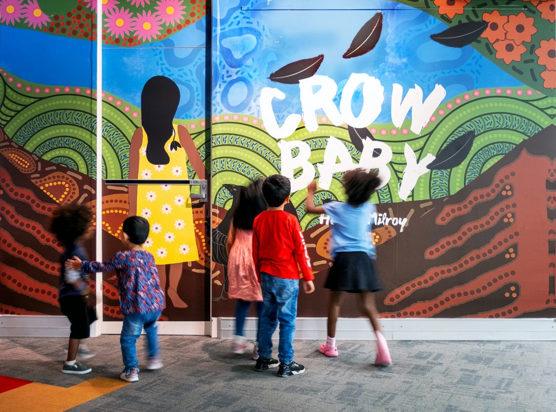 Children looking at the Crow Baby exhibition in the Story Place Gallery