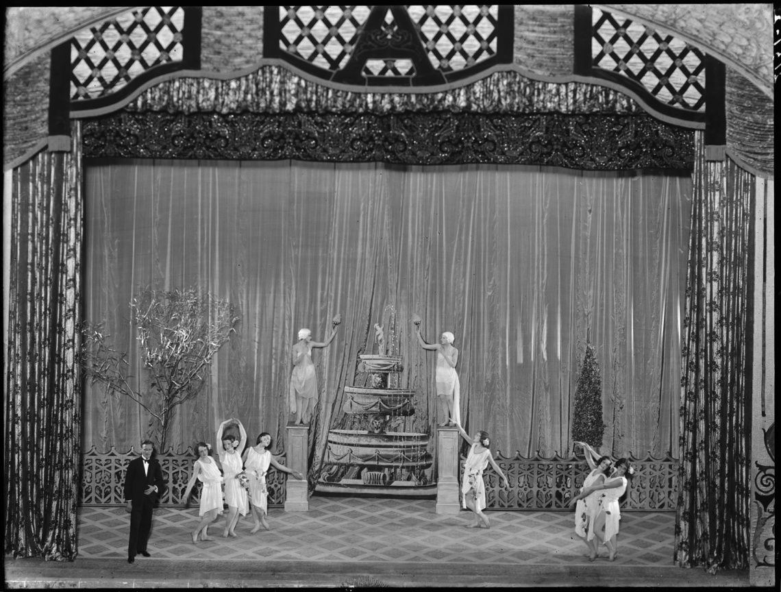 Performers on stage 1930 Ambassadors Theatre