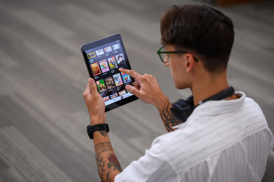 client using a tablet to browse eresources