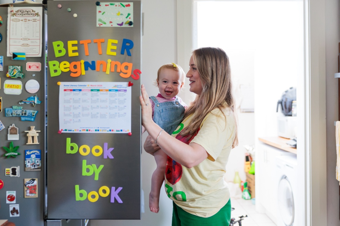 Mum and baby looking in fridge