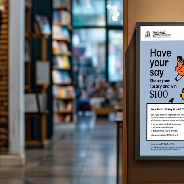 A poster on the side of bookshelves in a local library reads Have your say