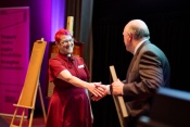 Annie Hudson Manager at the Bindoon Library accepting award from Hon John Day