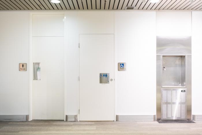 The Theatre foyer showing door of accessible toilet