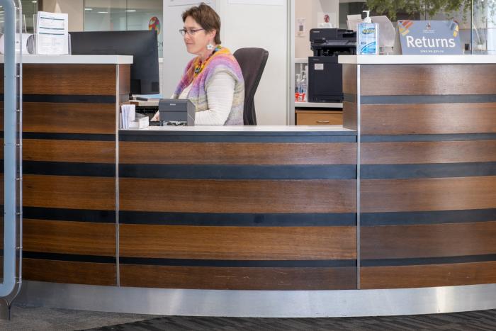 The welcome desk with cutout for wheelchairs