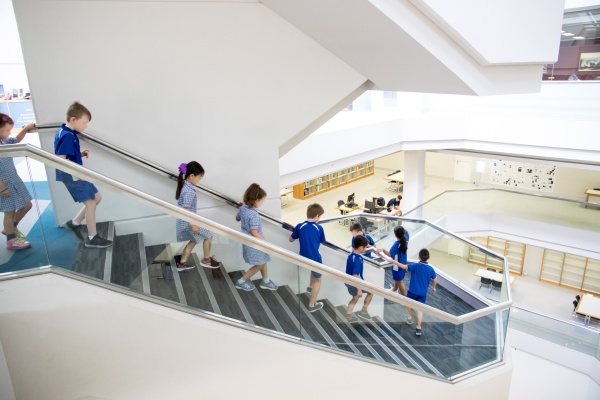Group of school children on stairwell