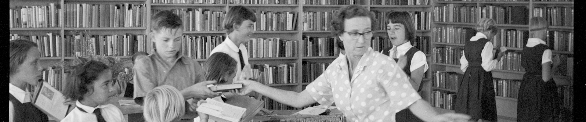 Librarian Patricia Morris lending out books at Kwinana Public Library 1959
