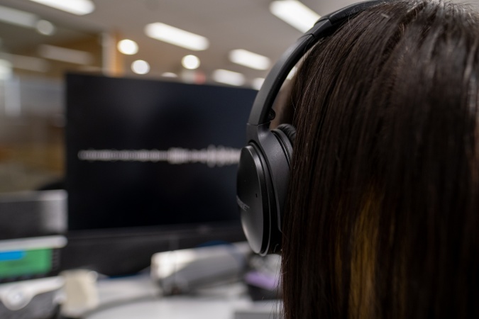 Volunteer transcribing an oral history