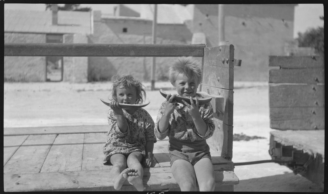 Pat and Bert Bell eating watermelon at Rottnest 1922