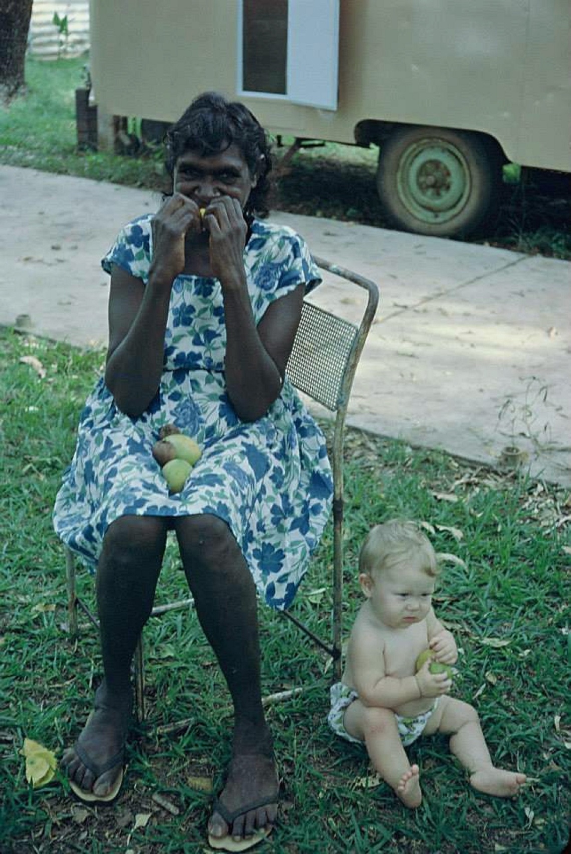 Women sitting with baby