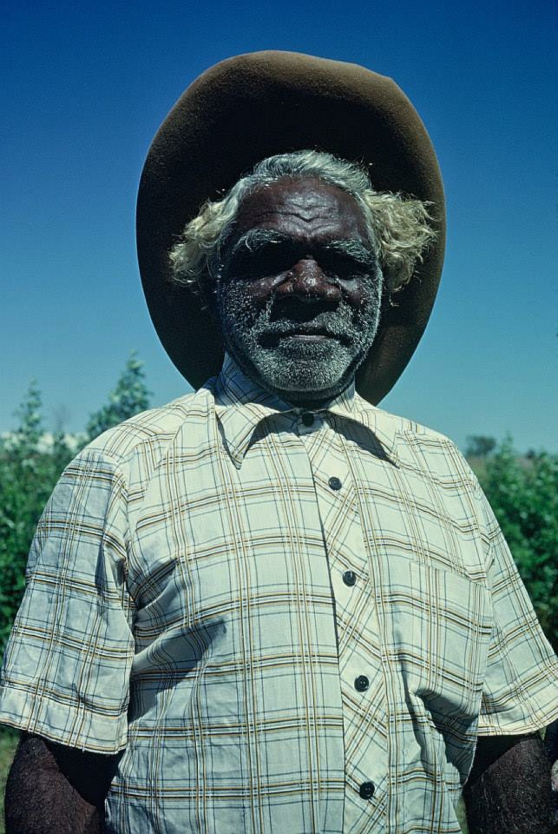 Man with bush hat standing